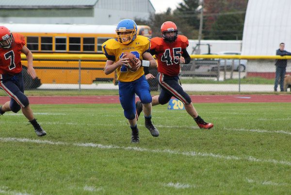 Quarterback Cayden Stowell looking for an open man to throw to