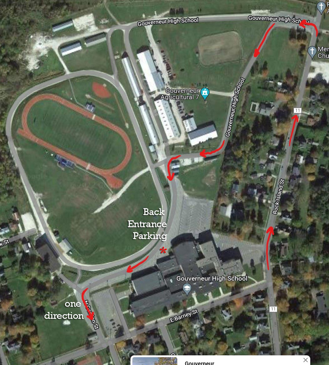 a google map of the high school showing the direction of traffic flow and where the back entrance parking is