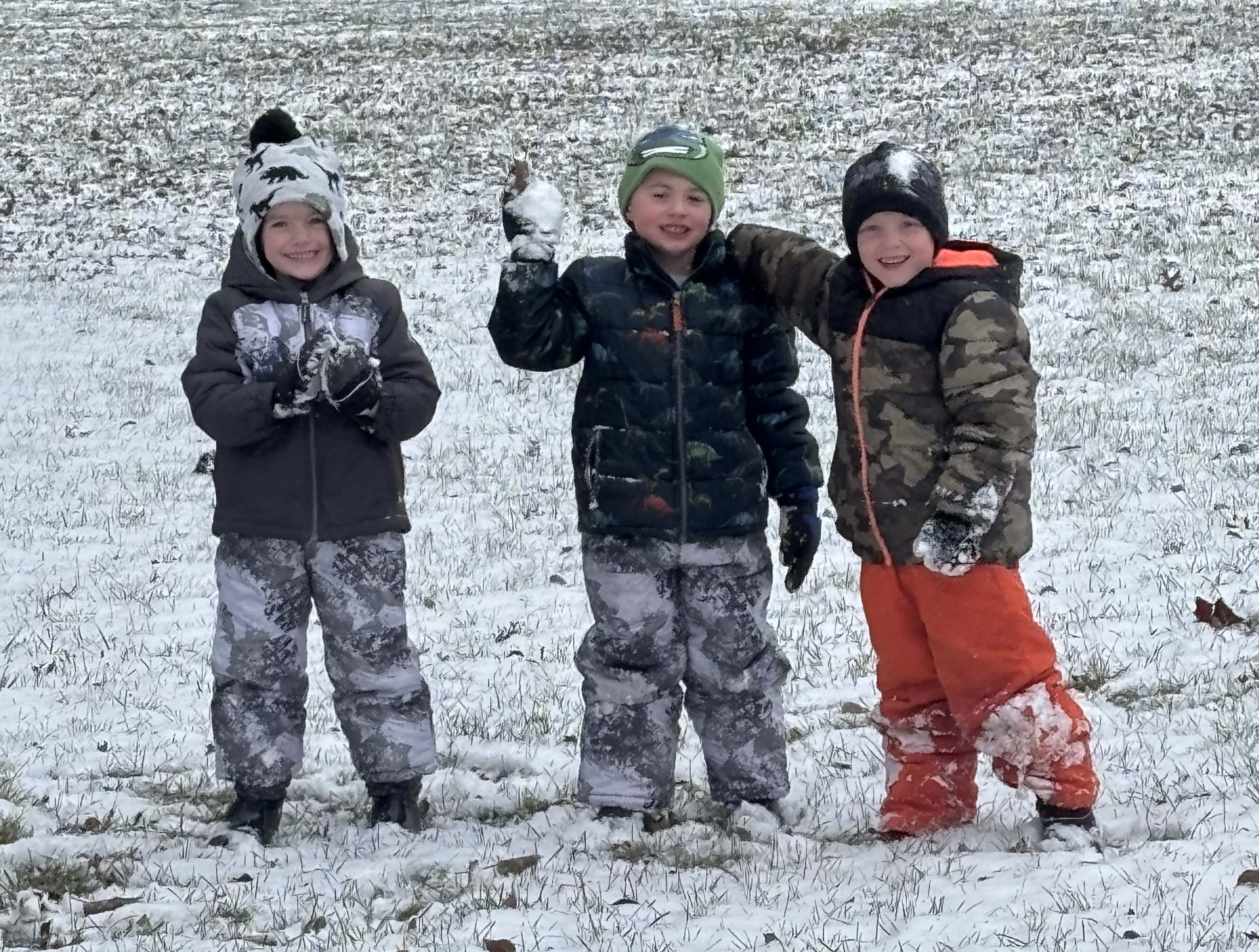elementary students playing in snow