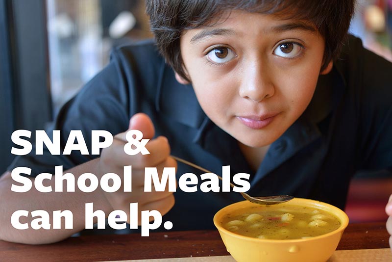 boy eating soup